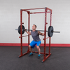 Best Fitness BFPR100R Power Rack red person doing squats