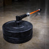 PRX Post Landmine with orange barbell and bumper plates