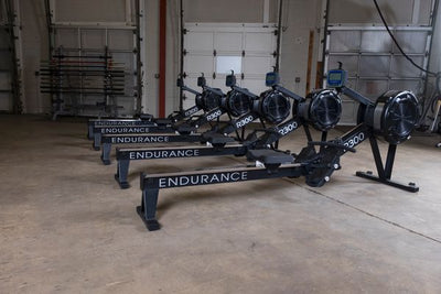 Endurance R300 rower black group of 5 rowers side view