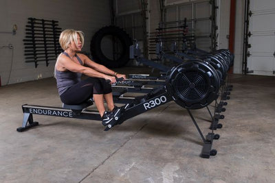 Endurance R300 rower at Simpsons Fitness Supply woman doing rowing exercises